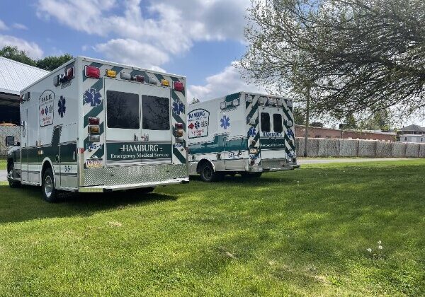 EMS Trucks Parked on Lawn